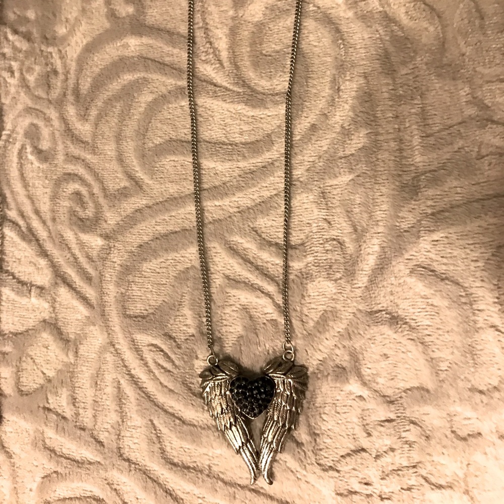 Short length silver winged black heart necklace